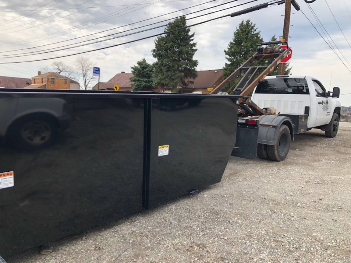 Black dumpster